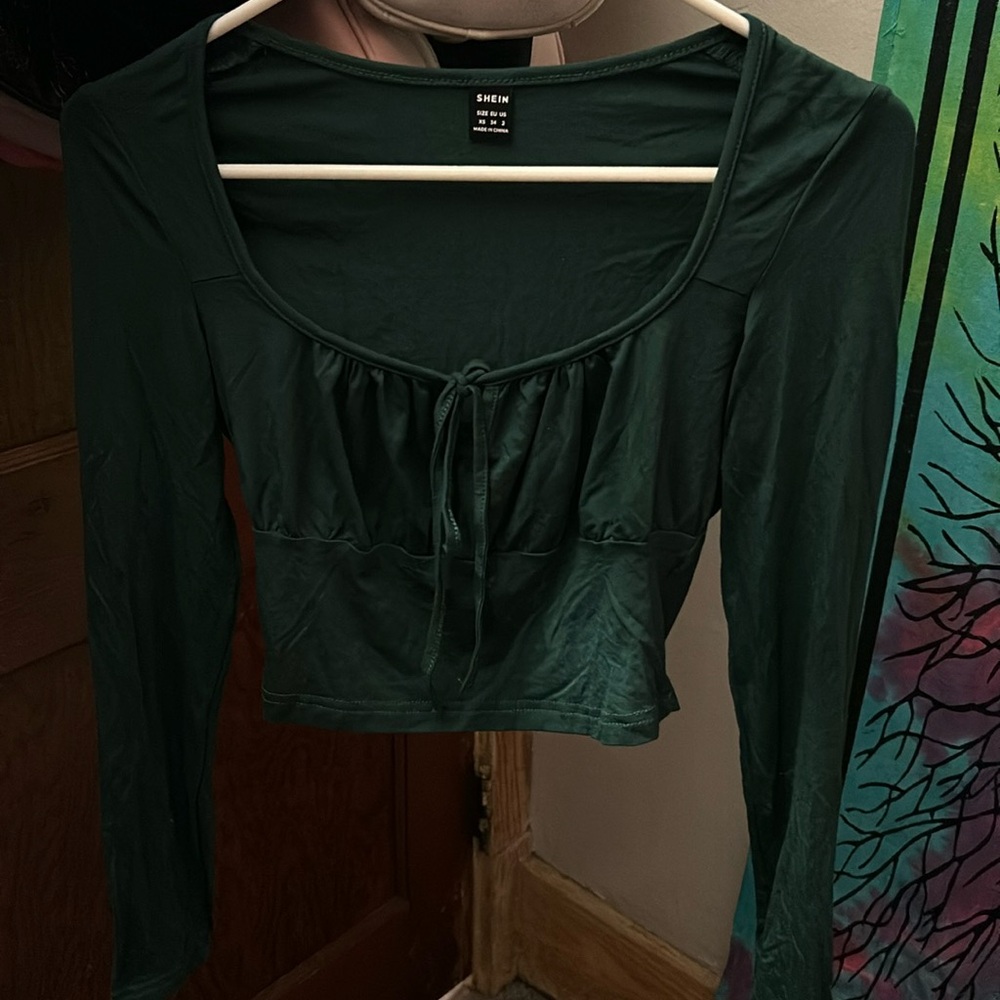 dark green cropped top